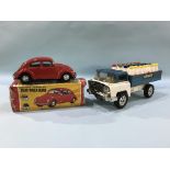 A Tri-ang milk truck and a tin plate Beetle