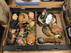 Two trays of Bosson and Legends wall masks