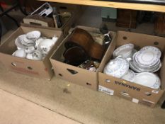 Four boxes containing dinner service, Oriental tea set, radios, clocks and cutlery etc.