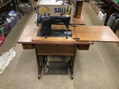 A Singer Treddle sewing machine