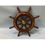 A modern mahogany ships wheel