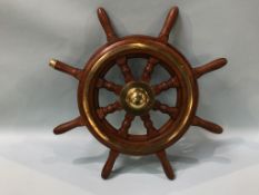 A modern mahogany ships wheel