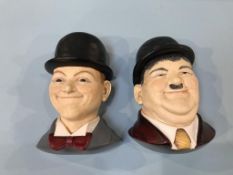 A Legends 'Oliver Hardy' and 'Stan Laurel' wall masks