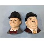 A Legends 'Oliver Hardy' and 'Stan Laurel' wall masks