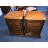 A pair of bedside cabinets, 51cm wide