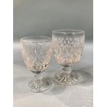 A collection of Waterford crystal glass, comprising twelve small wine glasses, twelve large wine