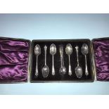 A cased set of silver tea spoons