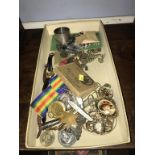 Various medals, silver fruit knives and brooches etc.