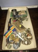 Various medals, silver fruit knives and brooches etc.