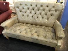 A good quality button down, two seater leather sofa