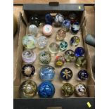 A collection of paperweights