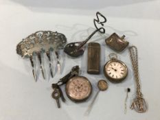 A silver comb, two pocket watches etc.