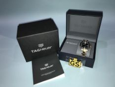 A Tag Heuer 'Formula 1' 41mm stainless steel and gold plated gents wristwatch, with box and some