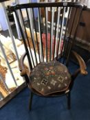 A spindle back carver chair