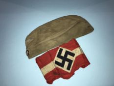 A Luftwaffe Tropical service cap and a Third Reich armband