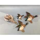 A Continental figure of a Ballerina and three Beswick wall mounted flying ducks