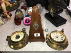 A metronome, modern ships clock and barometer