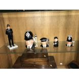 Five Royal Doulton Police figures and Toby jugs