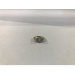 An 18ct diamond and aquamarine ring, 4g, size 'K/L'