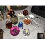 Ten various paperweights