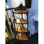 A Victorian rosewood barley twist corner four tier what not