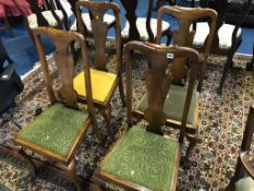 Four walnut Queen Anne style chairs