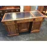An Edwardian mahogany desk, 137cm wide, 52cm deep, 79cm high (inset for legs 54cm wide, 66cm high,