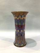 A tall Royal Doulton vase, number X8860 and 9238, decorated in colourful geometric designs, 33cm