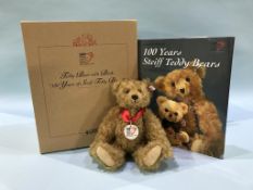 A Steiff Teddy Bear with Book, white tag number 038884, limited edition of 1902, golden mohair teddy