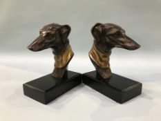 A pair of dogs head bookends