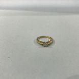 An 18ct gold diamond solitaire ring, 3.8g, size 'L/M'