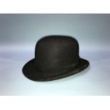 A Dunn and Co. bowler hat