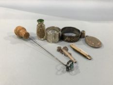 A silver oval locket, a silver thimble, a small enamelled and silver scent bottle etc.