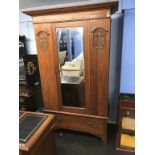 An oak Edwardian wardrobe