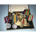 A collection of various World War I and World War II medals (unnamed) etc.
