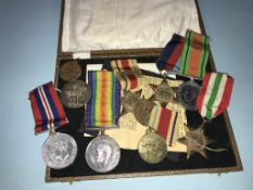 A collection of various World War I and World War II medals (unnamed) etc.