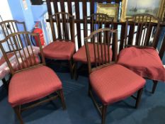 A set of six mahogany style dining chairs