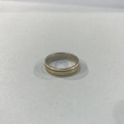 A silver and gold ring