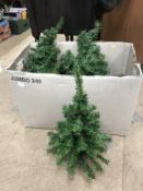 A box of artificial Christmas Trees