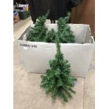 A box of artificial Christmas Trees