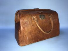 A leather two handled doctors bag