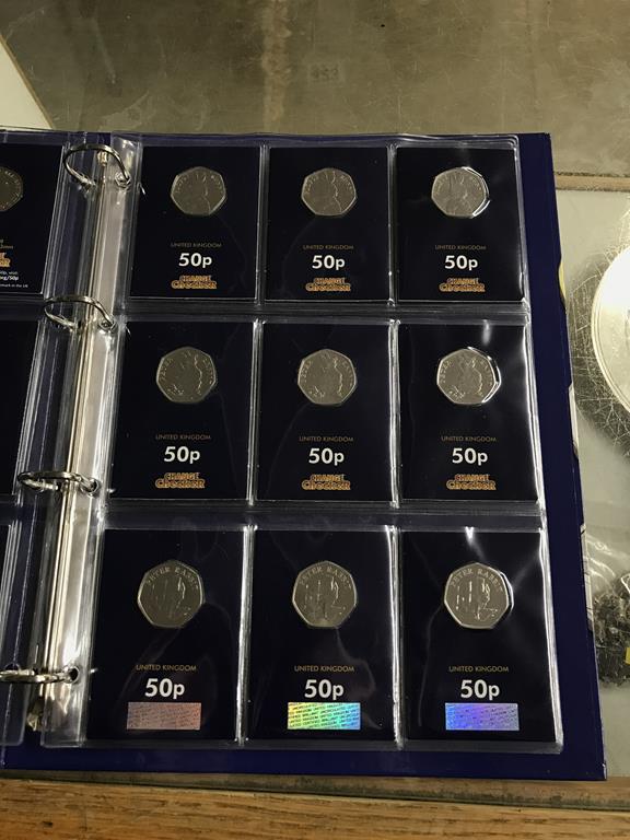 Two boxes of coins, to include eight Change Checker files of various coins, including collectors £ - Image 35 of 106