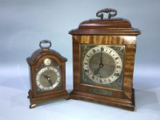A small Elliot clock for Garrard and Co, and another larger Garrard clock, 18cm height and 30cm