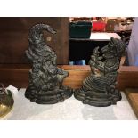 A pair of cast iron Punch and Judy door stops