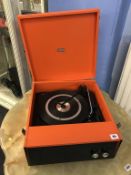 An orange 'Wye' record player