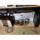 A shelf of assorted, to include a radio