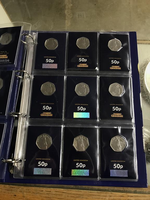 Two boxes of coins, to include eight Change Checker files of various coins, including collectors £ - Image 34 of 106