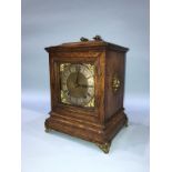 An Edwardian oak cased mantel clock, with eight day movement and strike action, 28cm height