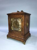 An Edwardian oak cased mantel clock, with eight day movement and strike action, 28cm height