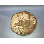 A large Japanese satsuma circular bowl, the centre decorated with ducks, signature to base, 30cm